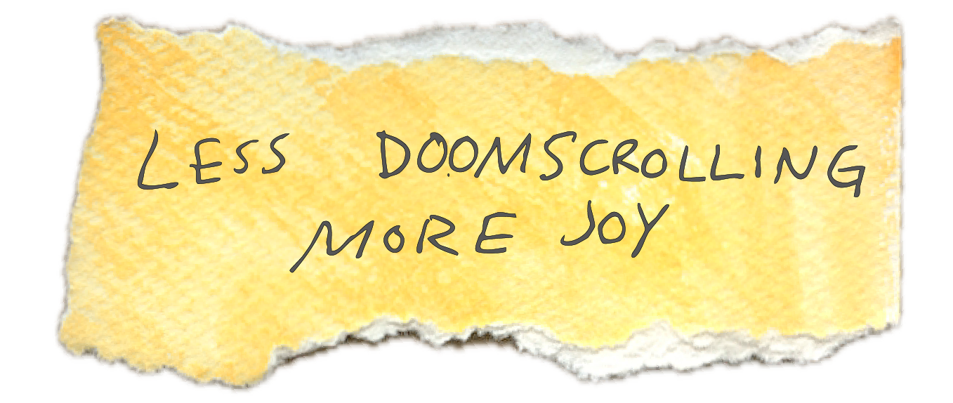 Torn yellow paper with handwritten message: "Less doomscrolling, more joy."