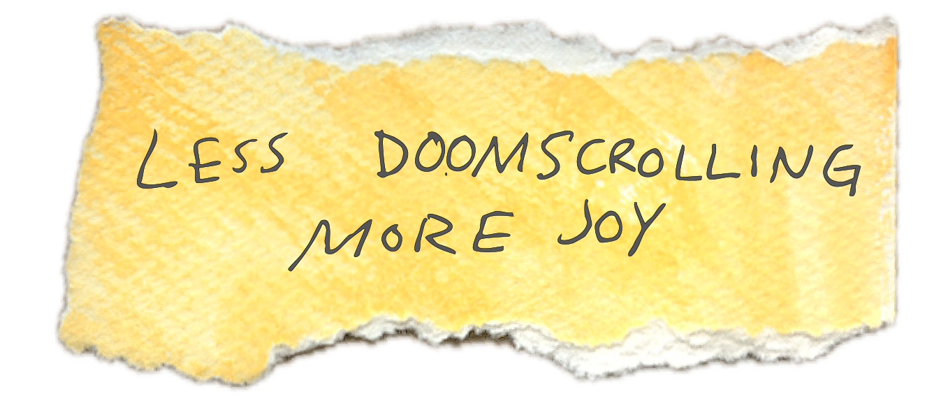 A torn piece of yellow paper with handwritten message saying 'Less DOOMSCROLLING More Joy'.