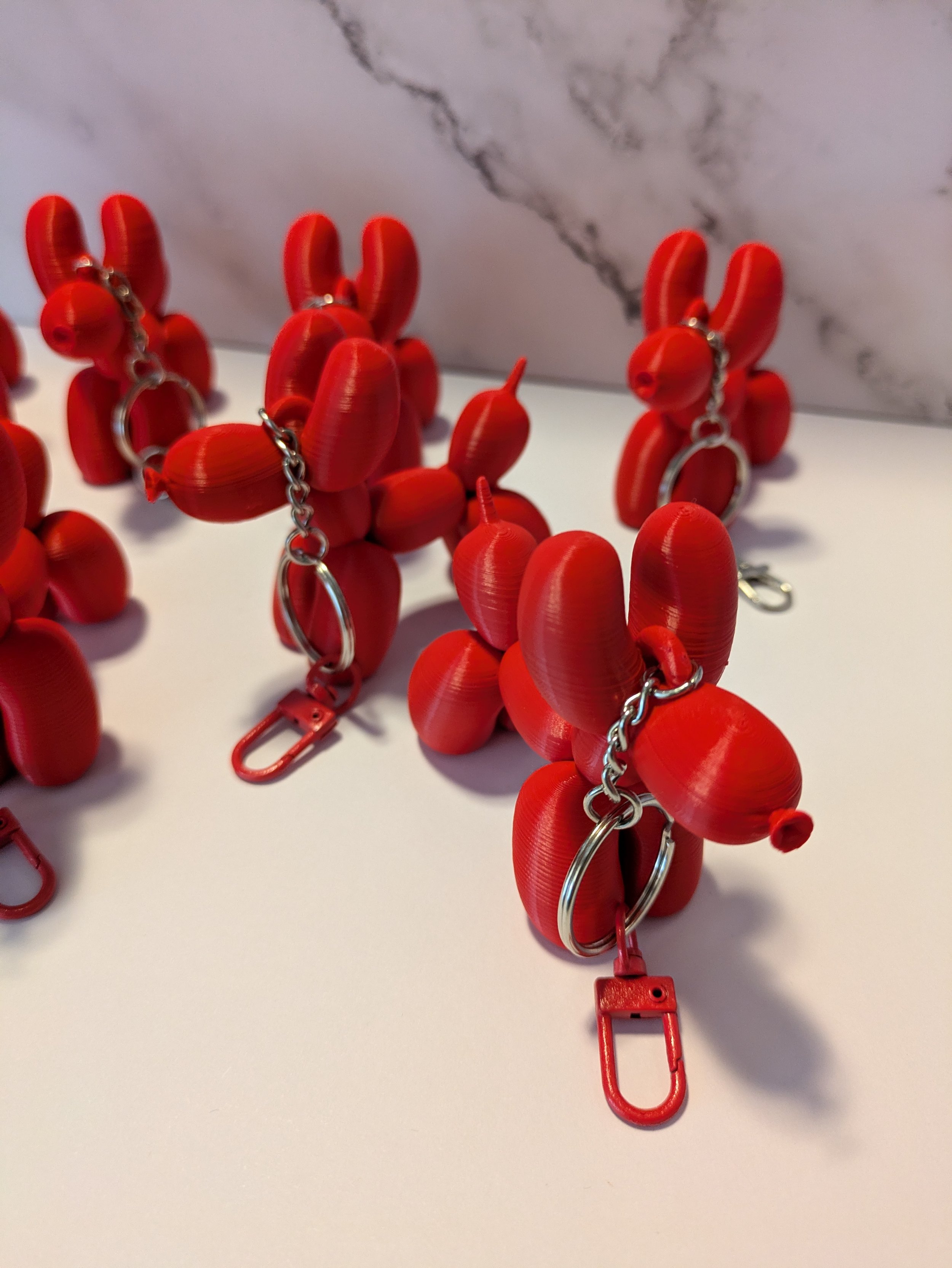 red balloon dog keychains