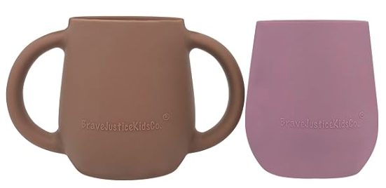 Two children's cups, one brown with handles on each side, and one purple with no handles.