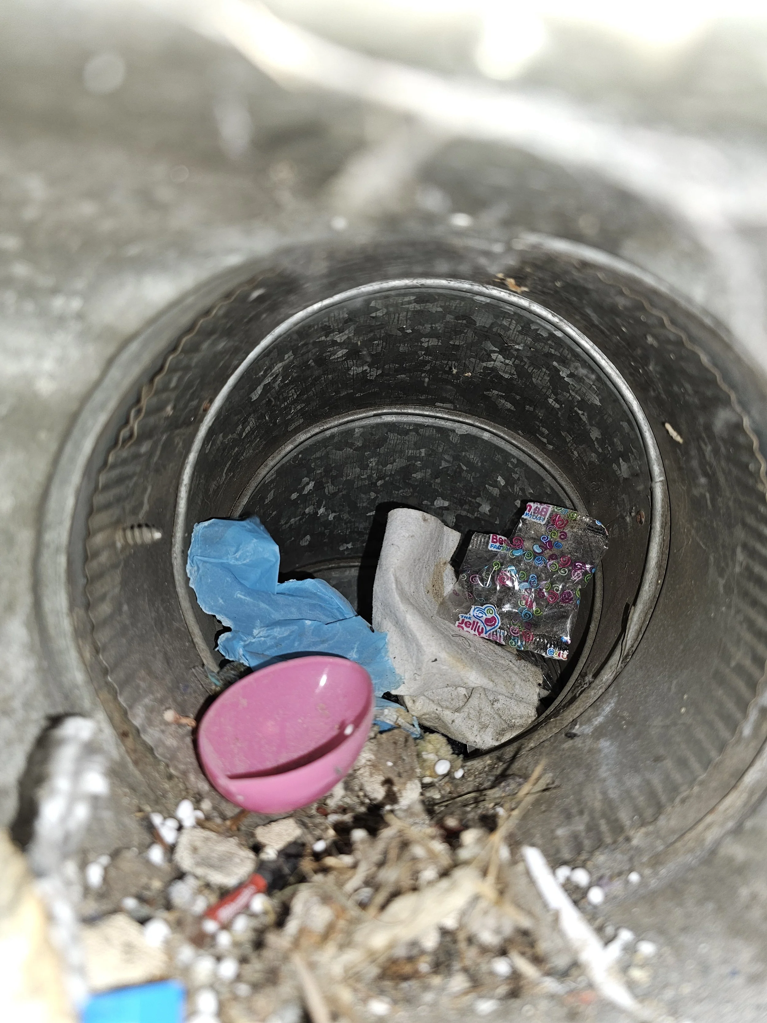 This duct was severely impacted by debris. We have a nearly 3 minute video of the debris being blown out of this duct by our air compressor driven tools. Air Duct Cleaning.