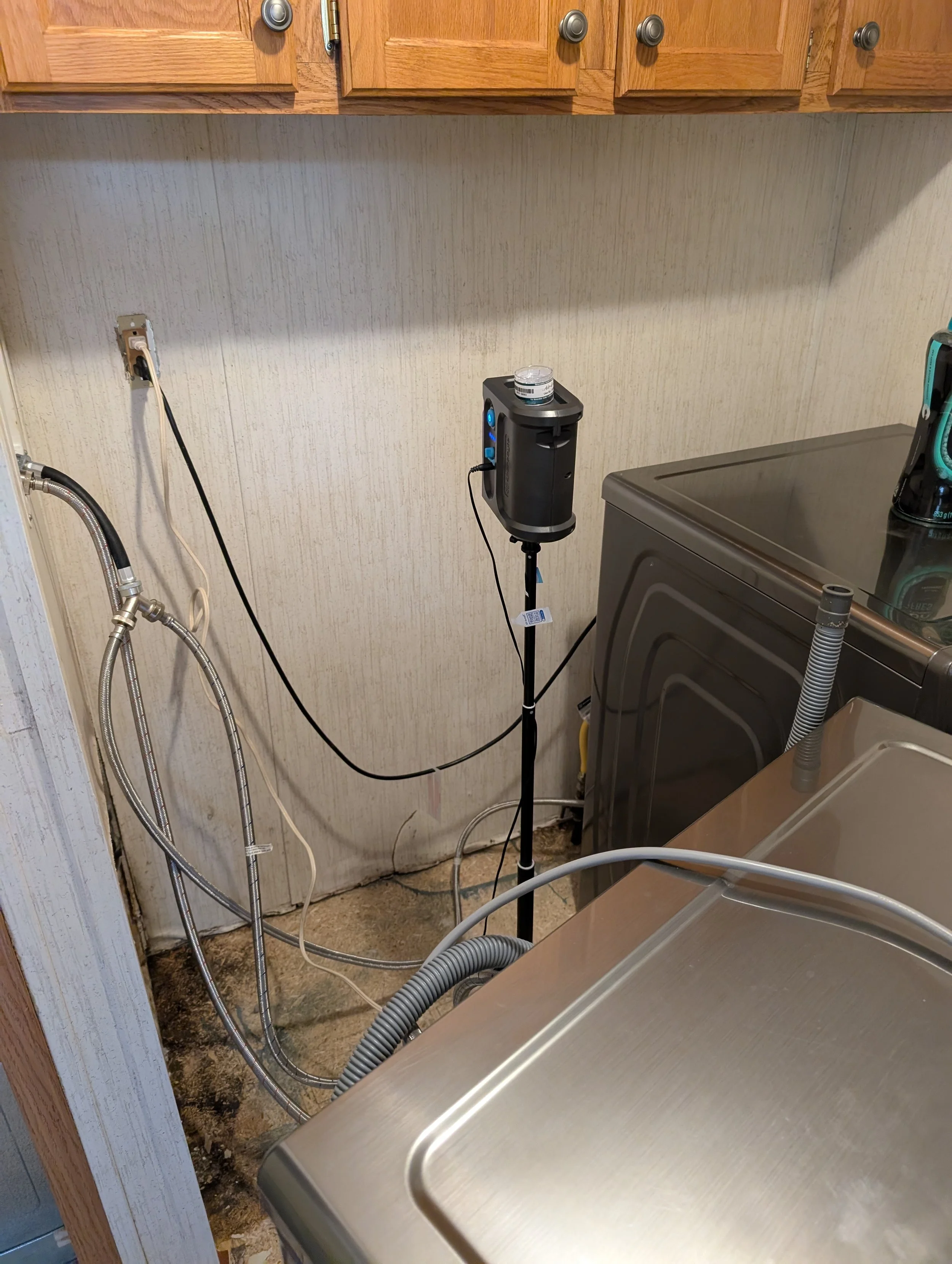 Taking air samples during a mold test.