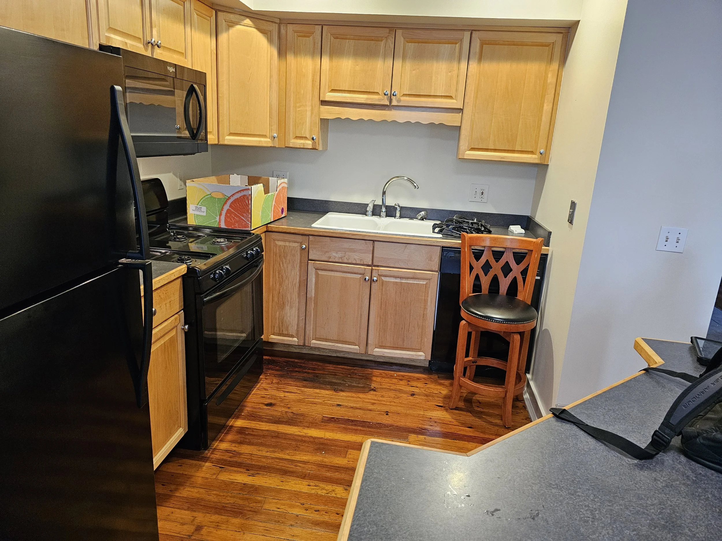 Old dated cabinets in need of being refinished.