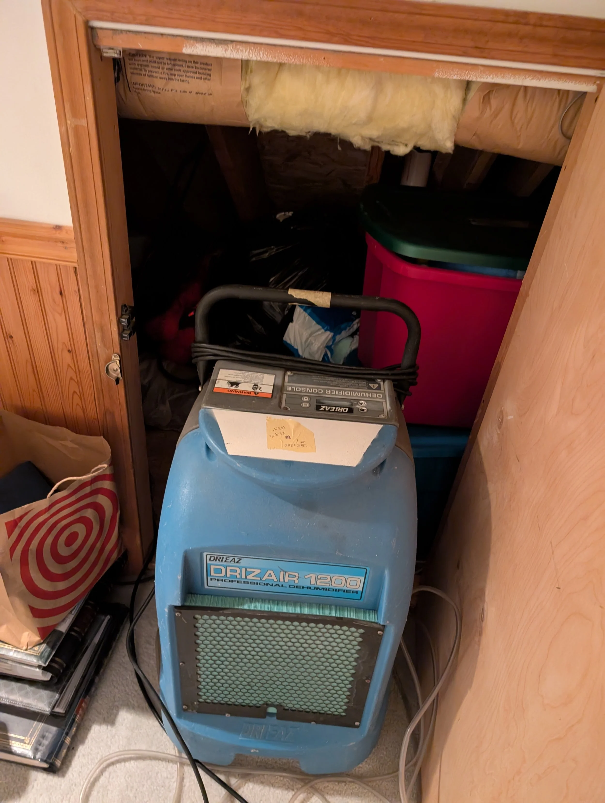 Using a dehumidifier to dry out the structure. Flood cleanup.