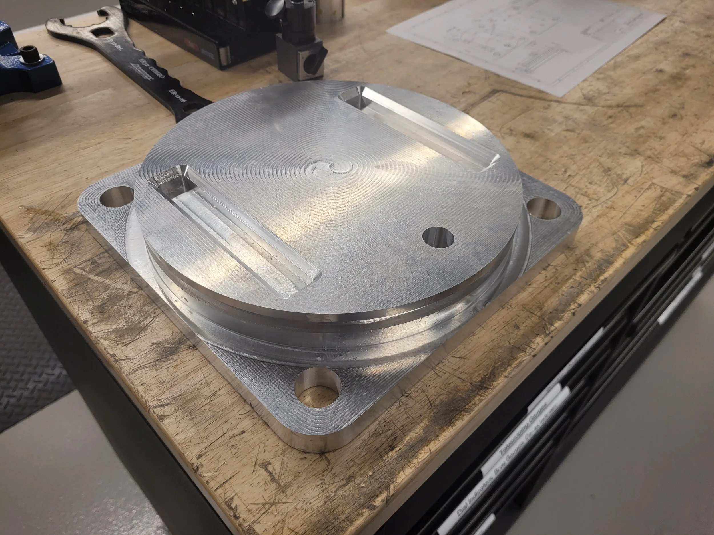 Finished base section with slots for fins
