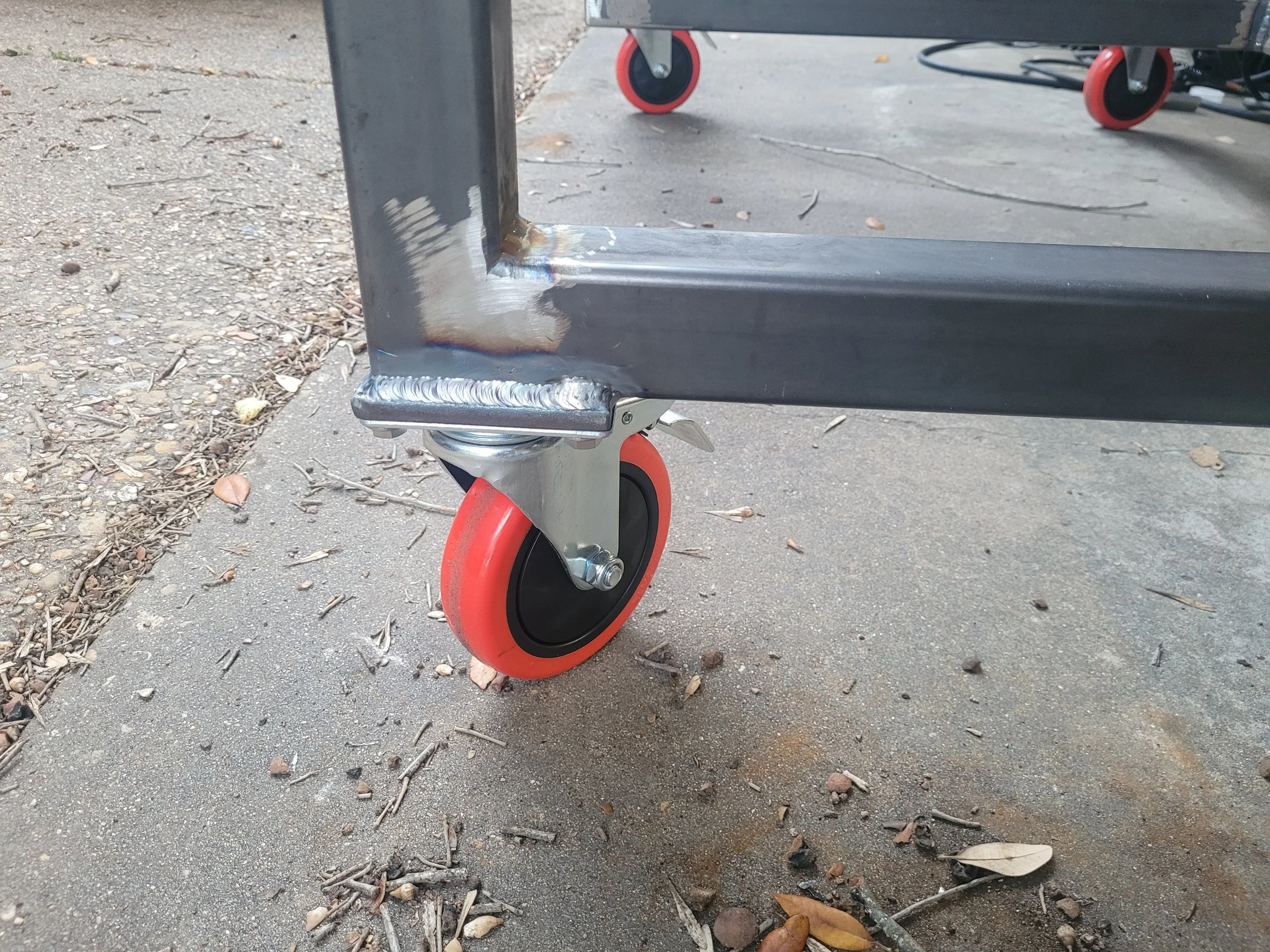 Welded on plates and installed casters