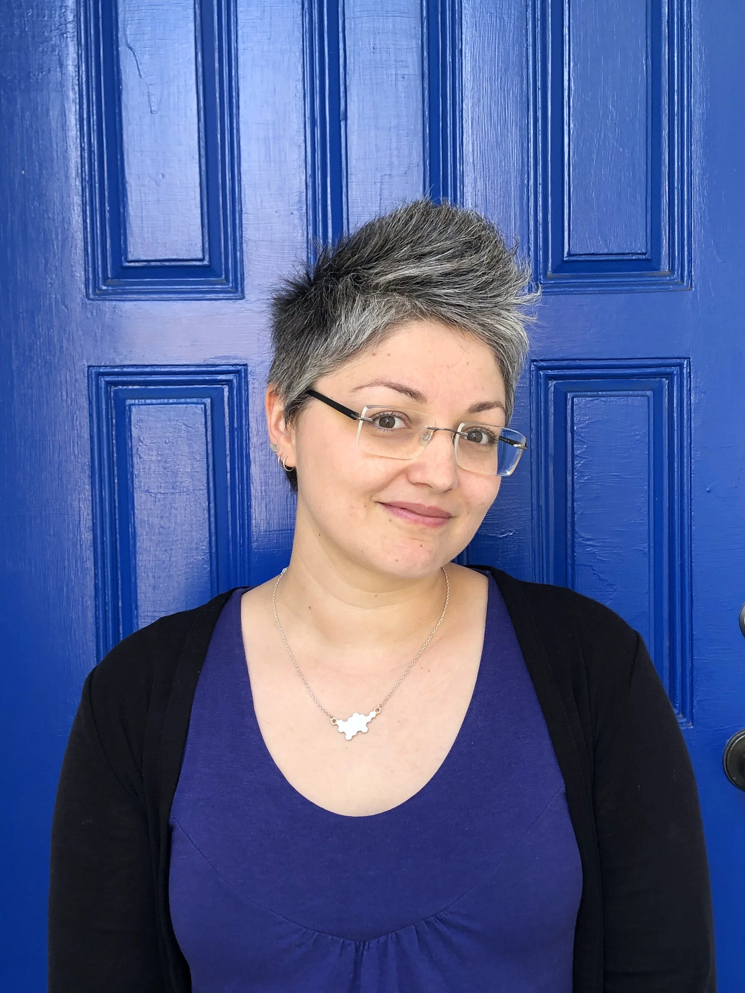 Lisa Headshot blue door.JPG