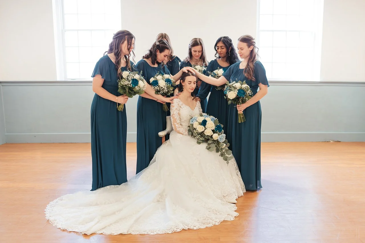 _laying hands aty a wedding.jpg