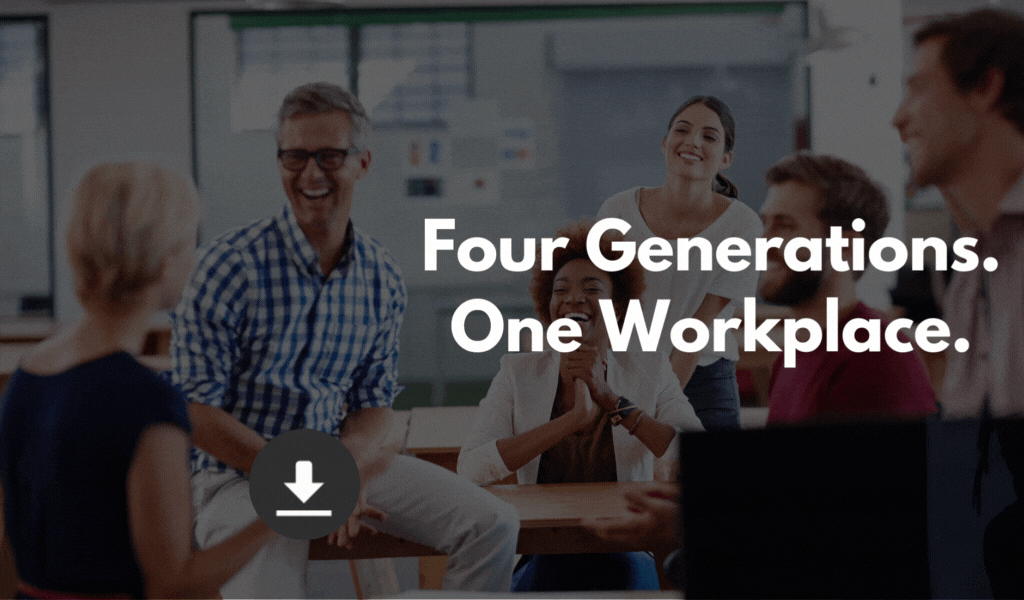 A diverse group of five people of four generations smiling and talking in a modern office with large windows.