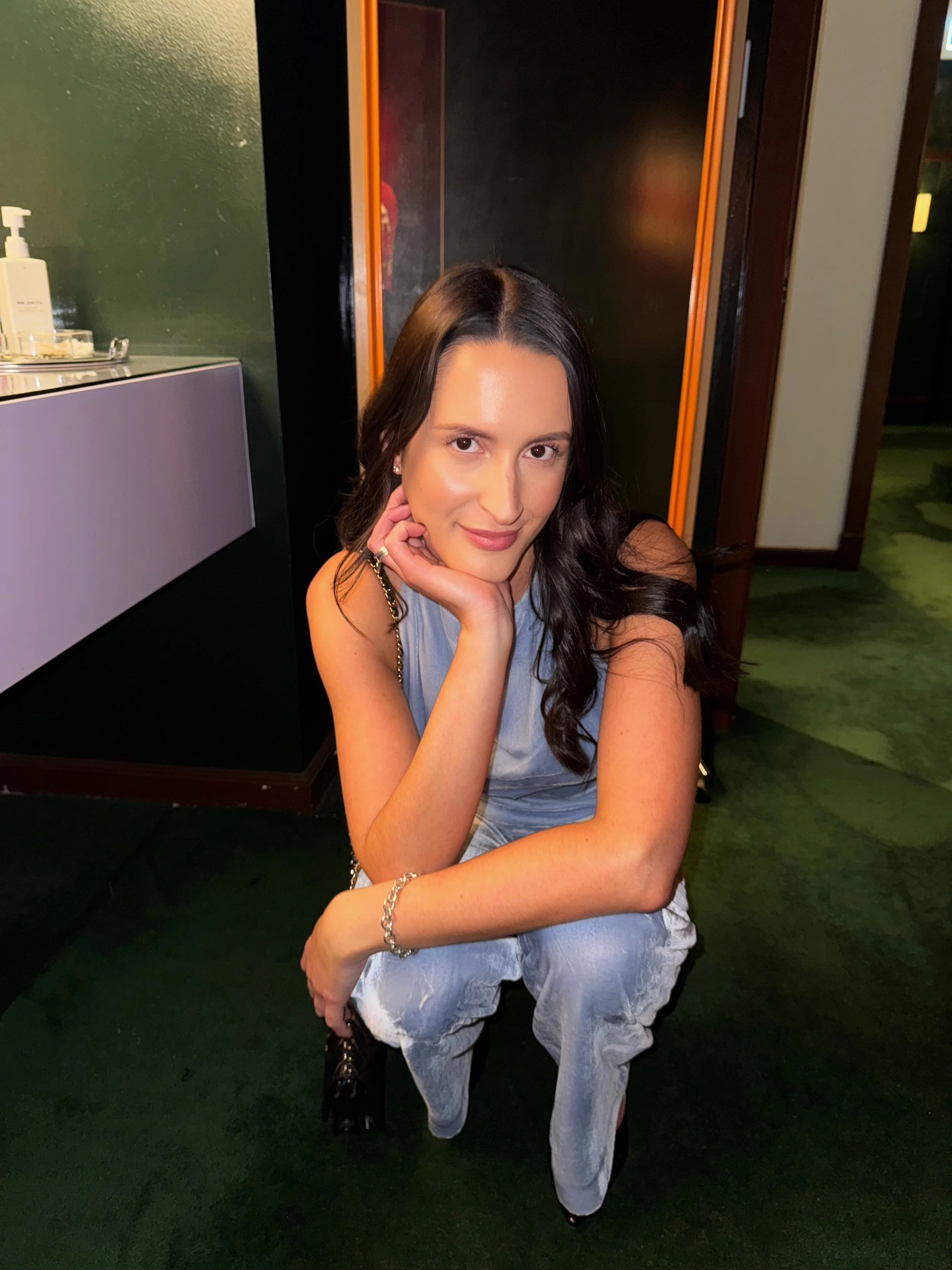 Taneesha Yates, founder of By T PR, photographed in a candid, warm moment - representing connection, authenticity, and the human side of modern PR