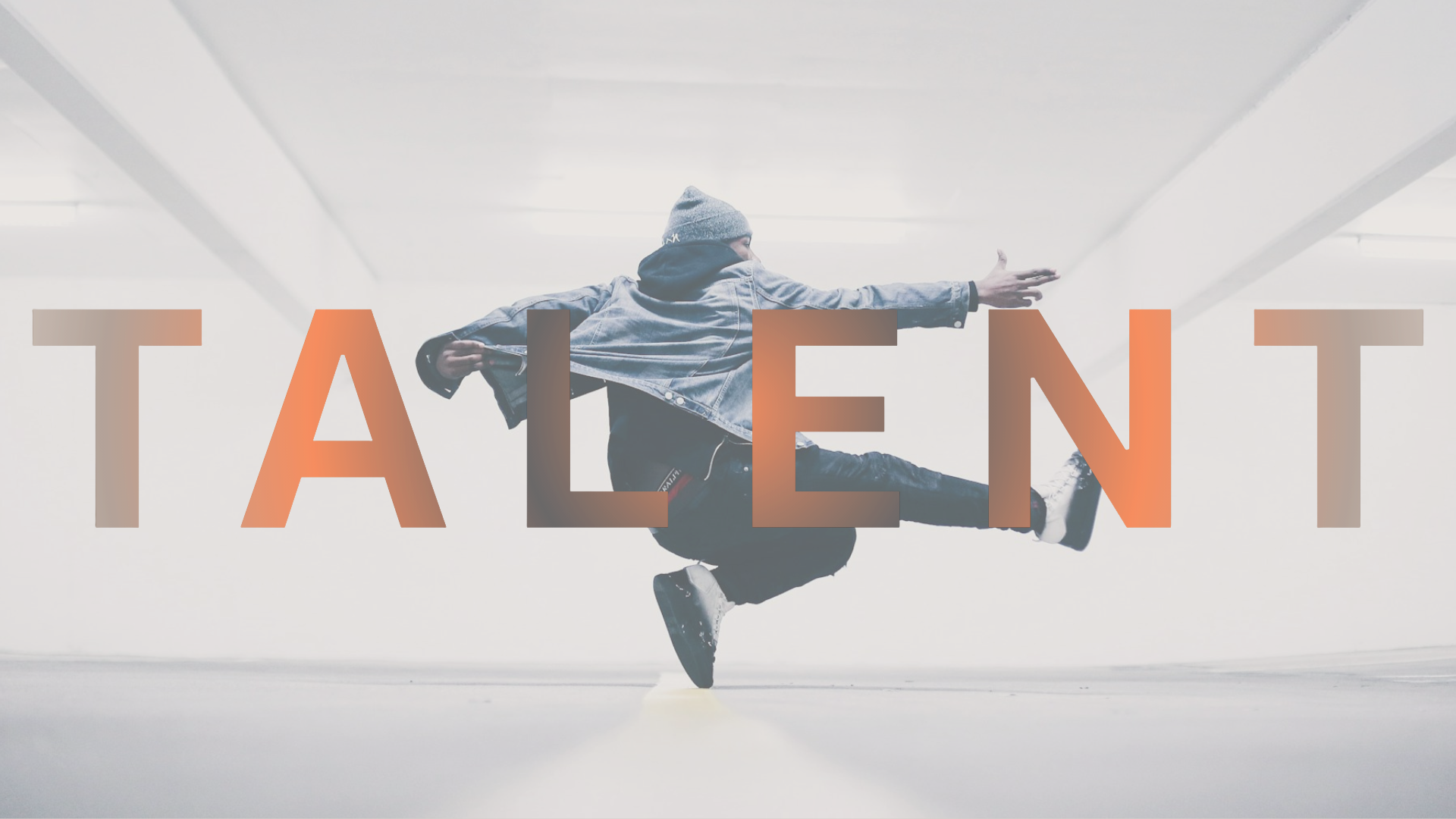 A person in casual clothing, including a denim jacket and beanie, is mid-jump with one leg extended in a parking garage. The word 'TALENT' is overlaid across the image in large, gradient-colored letters.