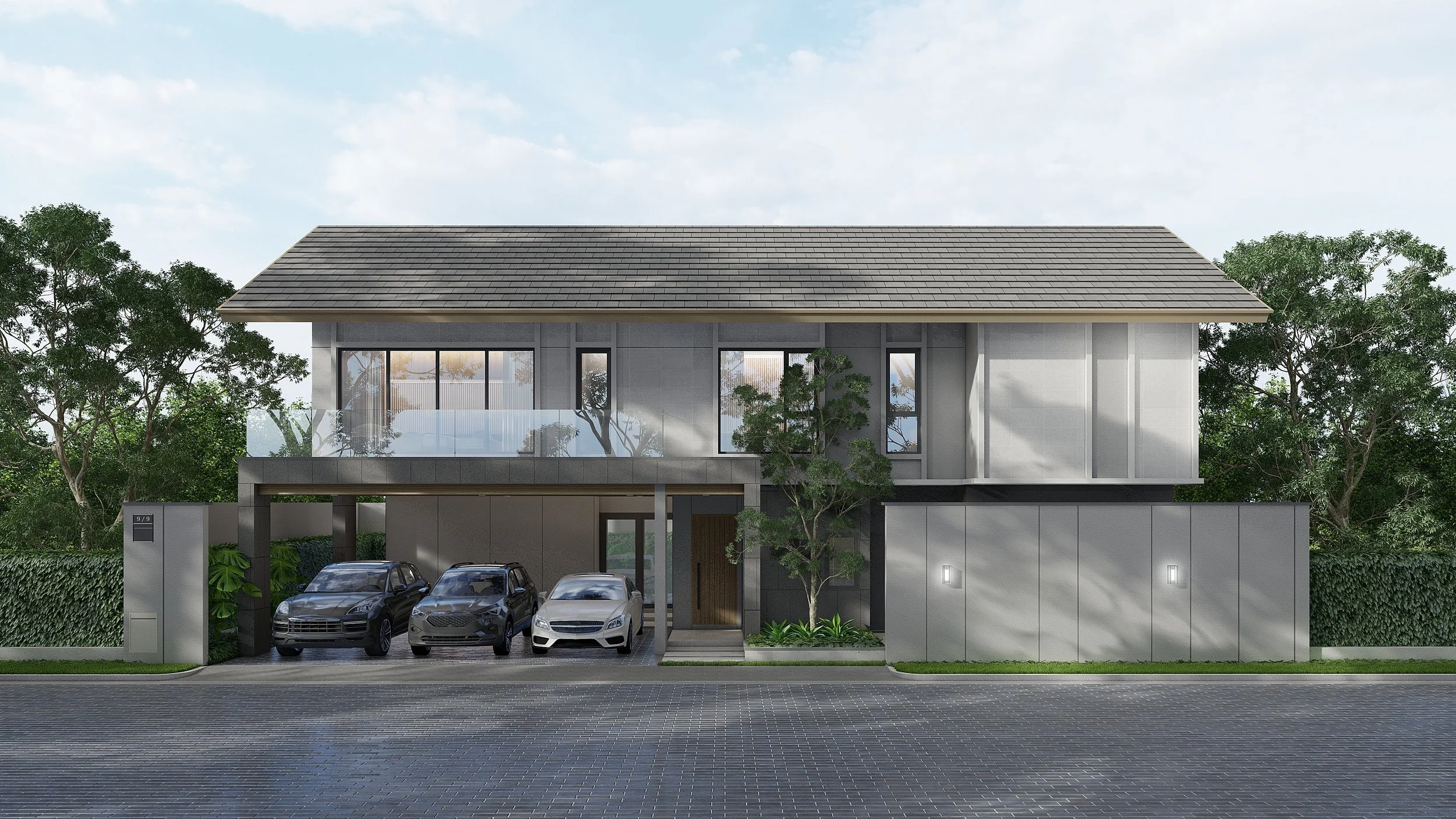 Modern two-story house with three cars parked in front, trees and greenery around, a glass balcony, and a paved road.