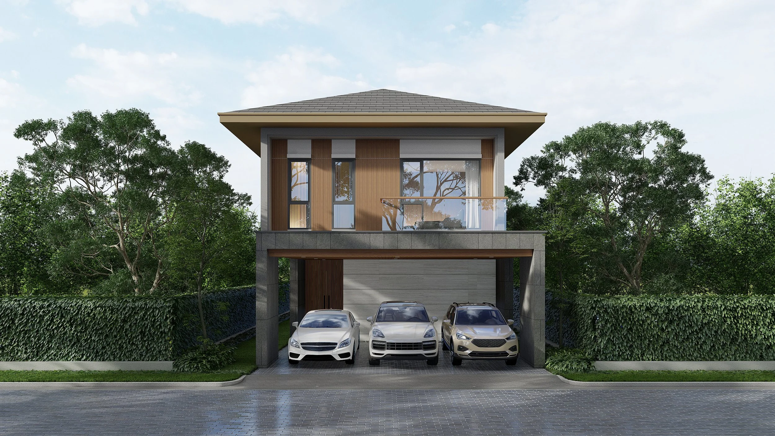 Front view of a modern, two-story house with three parked cars in the garage, surrounded by green trees and hedge, under a cloudy sky.