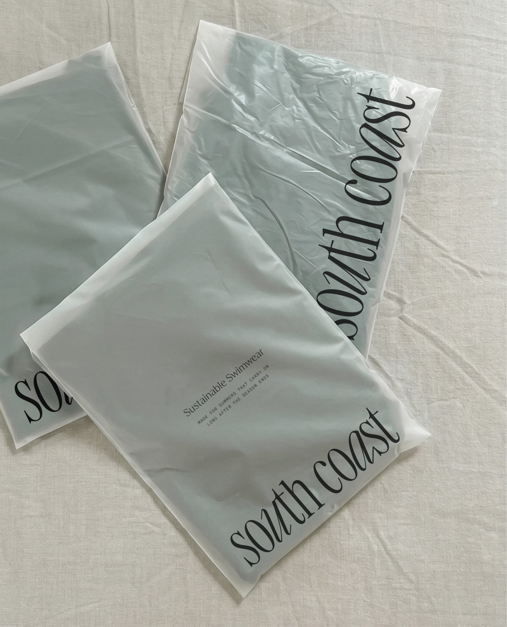 Luxury swimwear packaging design for Australian swimwear brand — slow fashion brand identity and print collateral by The Kinn Co