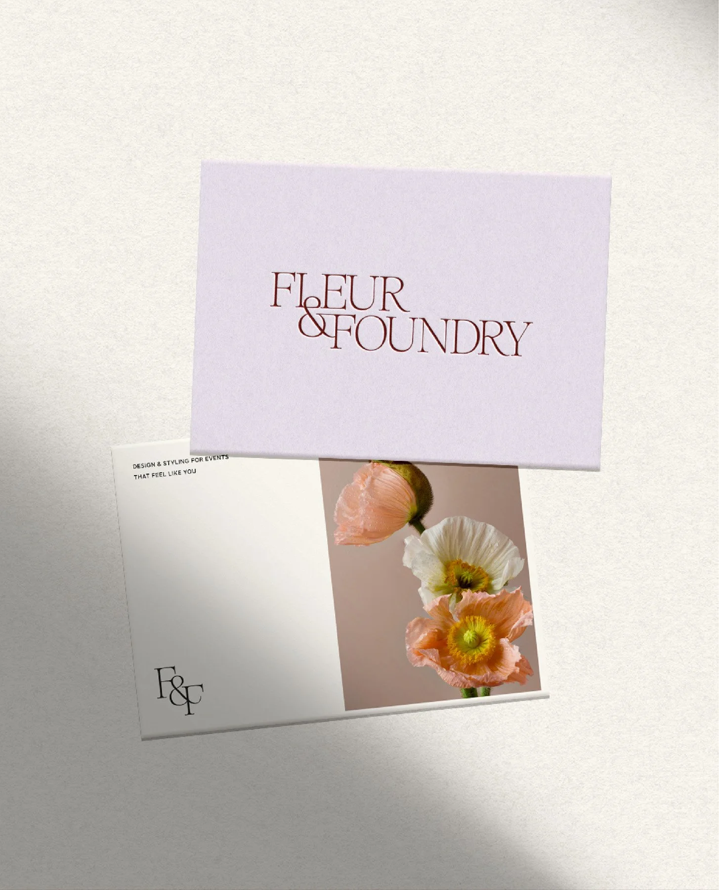 Lavender envelope and postcard mockup featuring the Fleur & Foundry logo and a poppy photo.