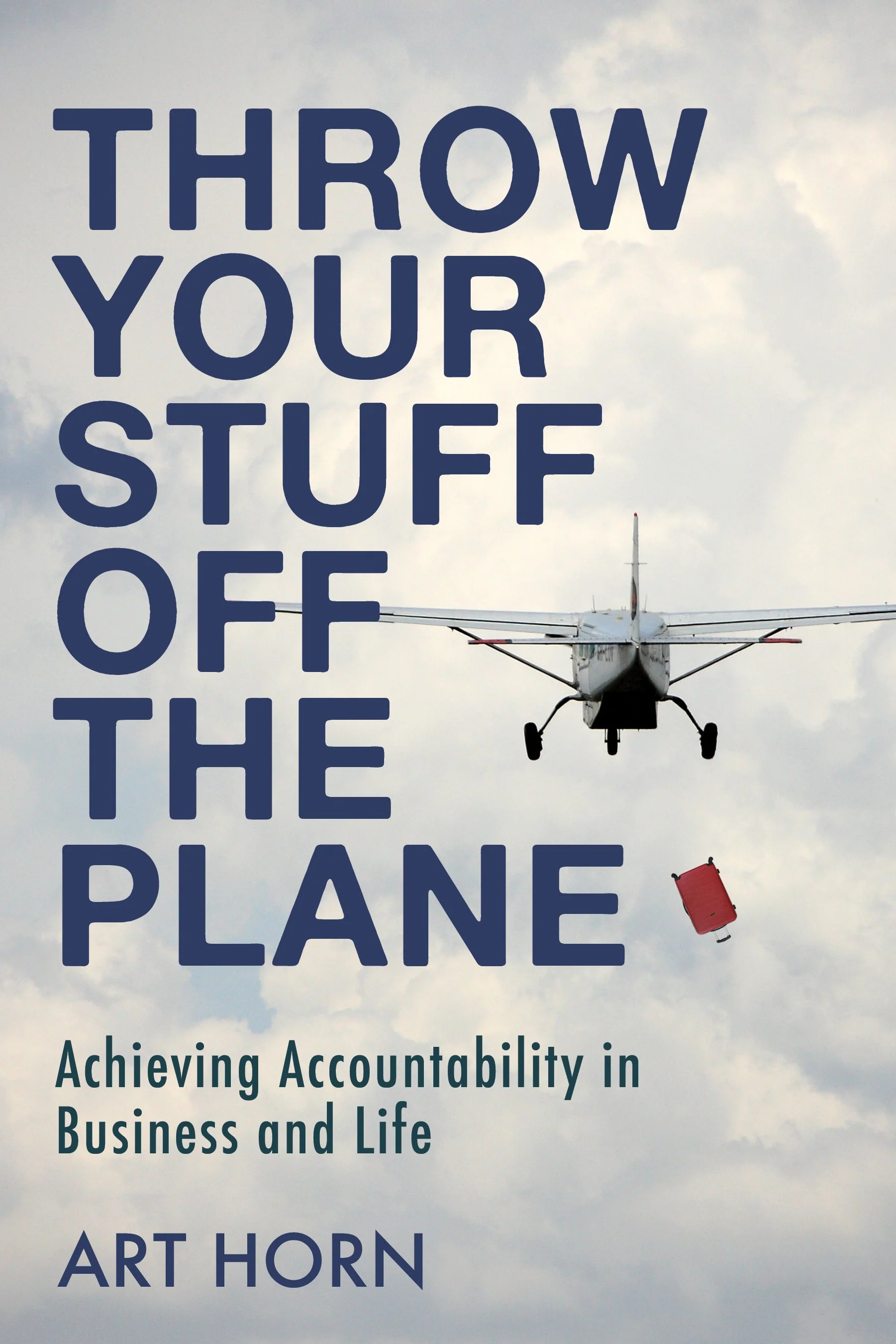 Cover of Throw Your Stuff Off the Plane by Art Horn, a leadership book on achieving accountability in business and life.