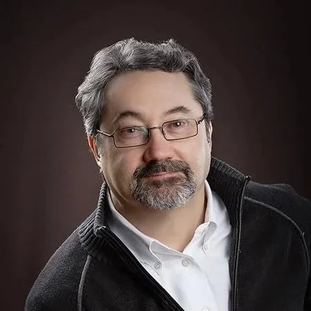 Professional portrait of Arthur (Art) Horn, Canadian author and executive coach at arthorn.ca, featured in articles and shorts on leadership development and communication.