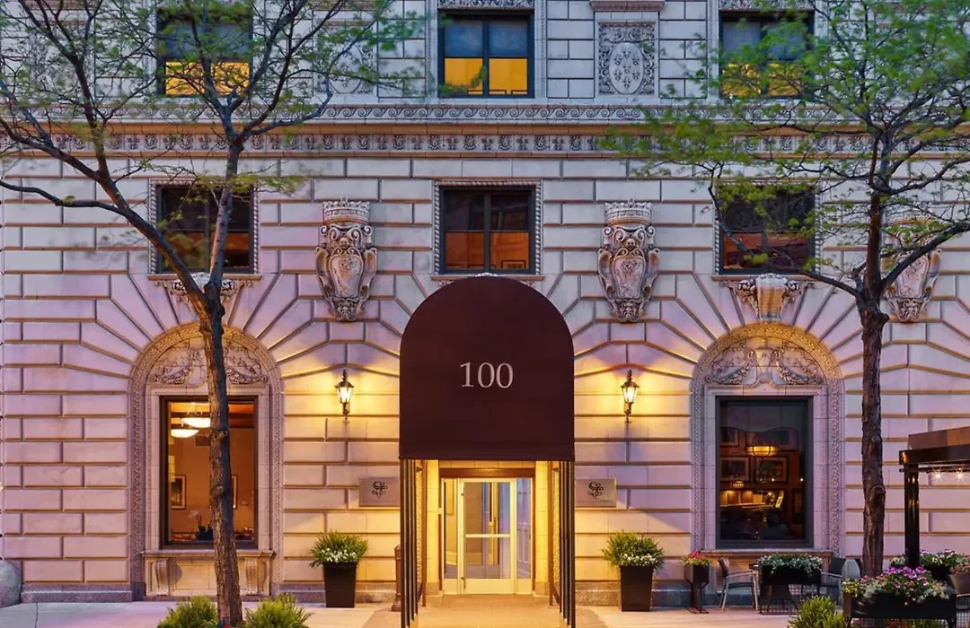 Tremont Hotel entrance with lanterns and patio seating