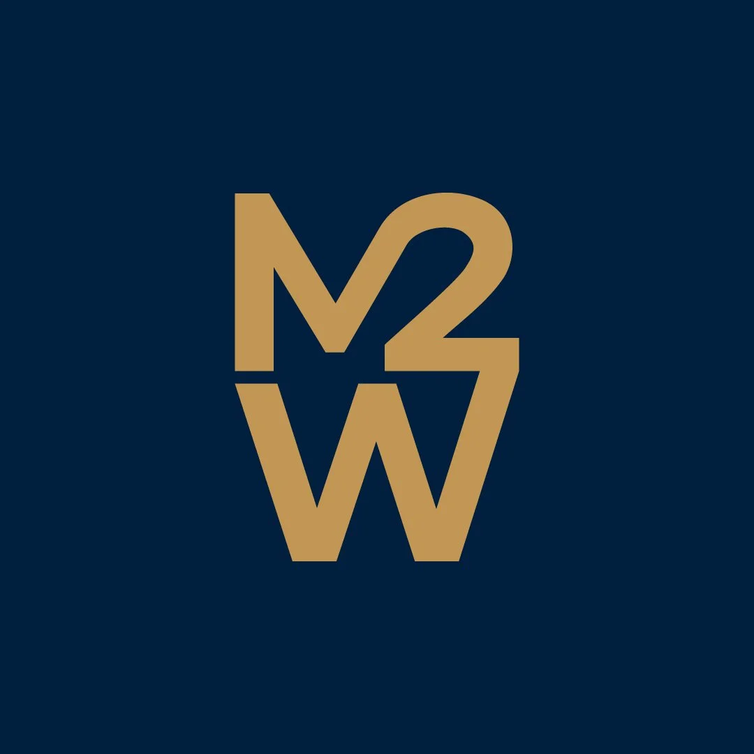 Logo with gold-colored 'M2W' letters on a dark blue background, with overlapping and stylized font.