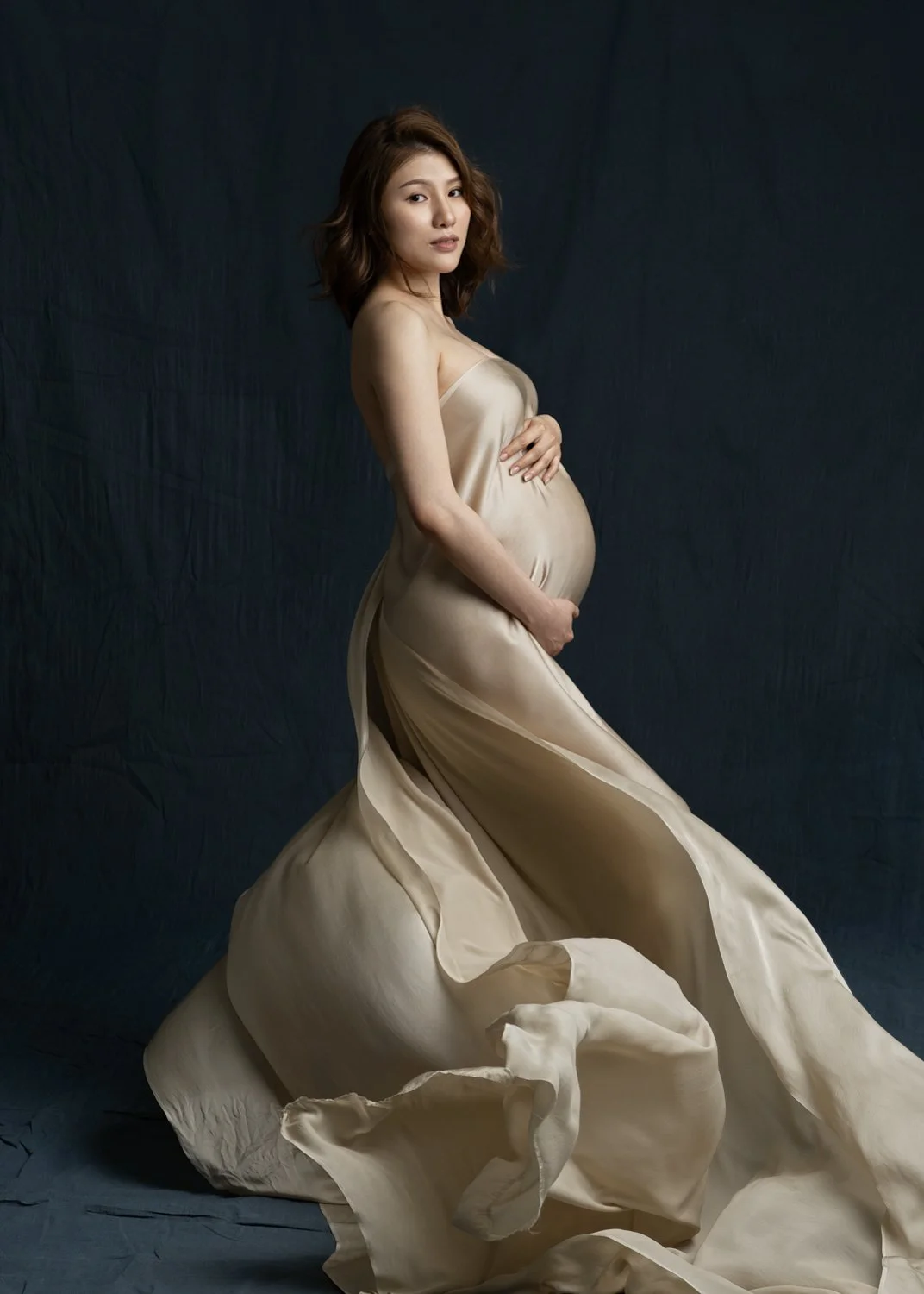Chic magazine-style maternity shoot for Vogue Hong Kong