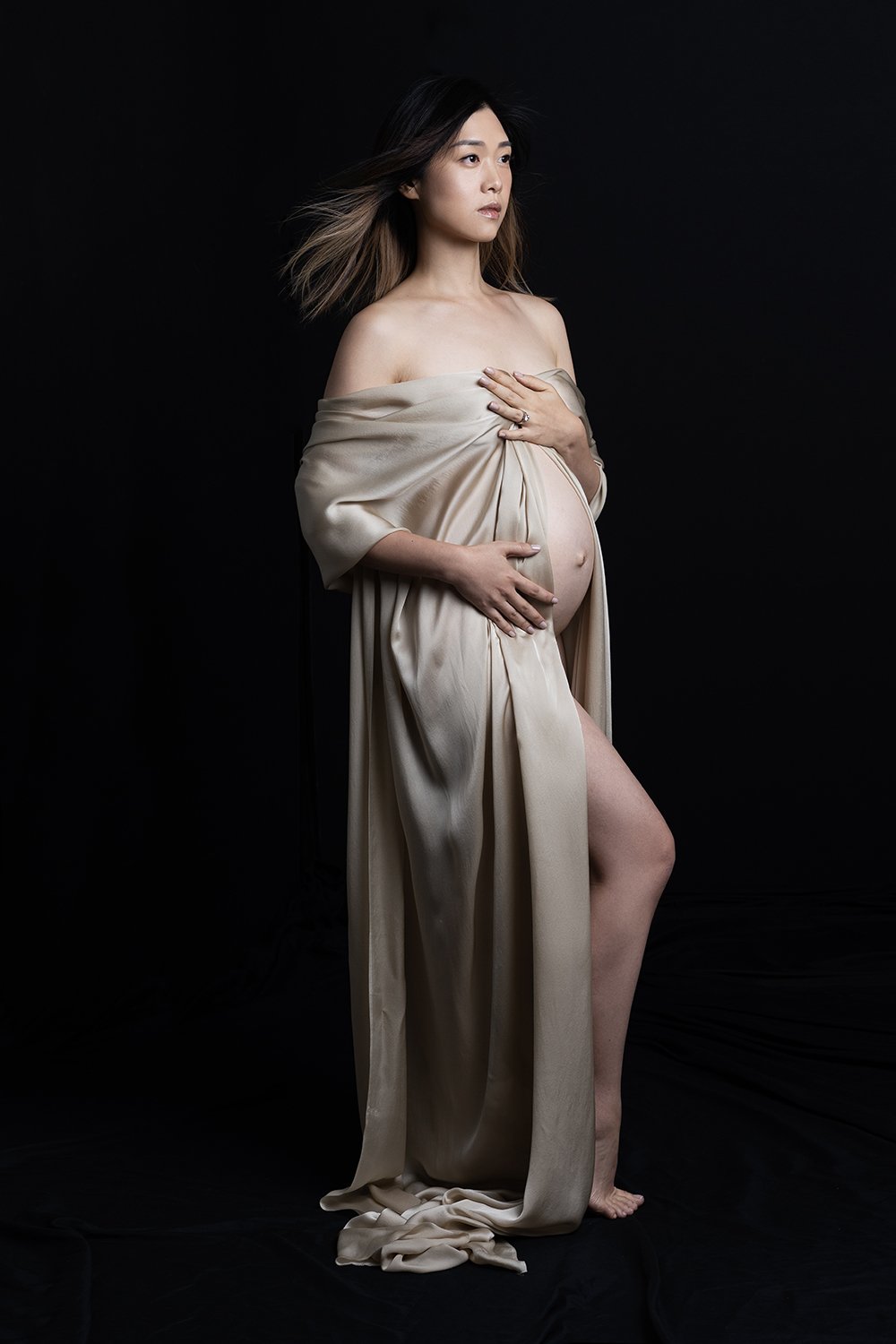 Timeless fashion editorial maternity portrait photographed by Kay Lai Studio in Hong Kong, capturing elegant and sophisticated motherhood moments.