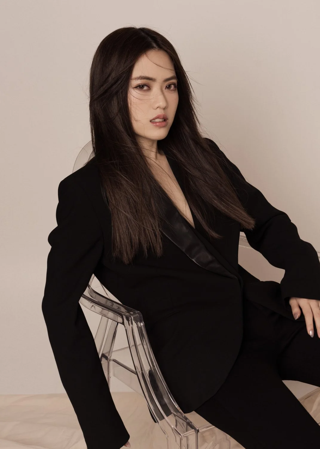 Timeless portrait photographed by Kay Lai Studio in Hong Kong. The subject wears a classic blazer, exuding confidence in this elegant editorial-style headshot.