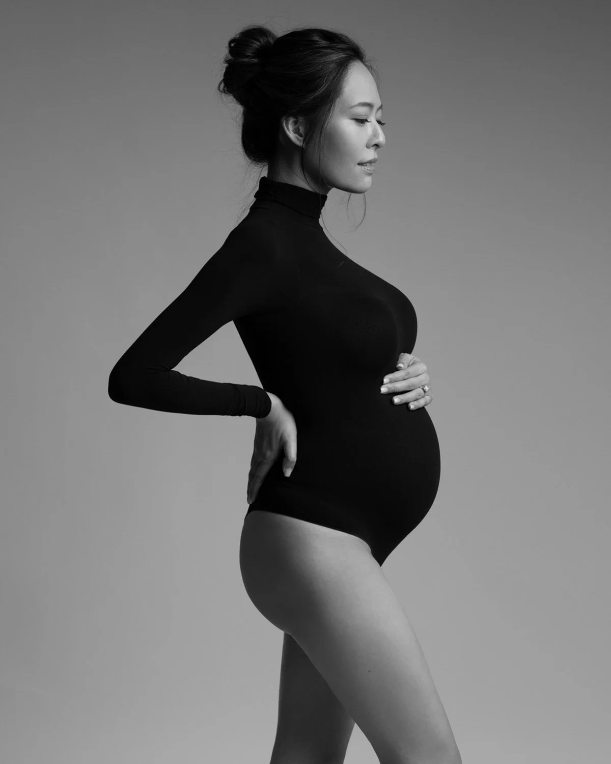 Timeless fashion editorial maternity portrait photographed by Kay Lai Studio in Hong Kong, capturing elegant and sophisticated motherhood moments.