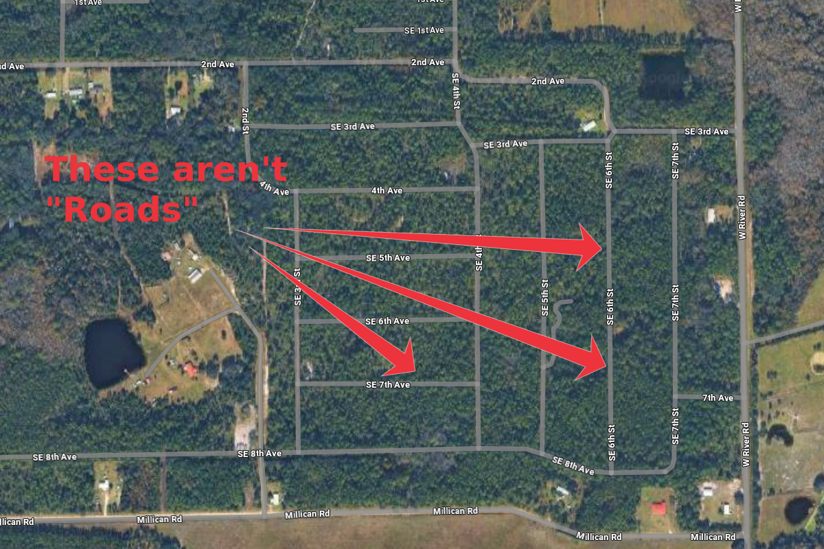 Satellite map showing a residential area with streets labeled SE 1st Ave through SE 8th Ave and SE 3rd St through SE 7th St. Red arrows point from the label "These aren't 'Roads'" to various streets, indicating they are not actual roads.