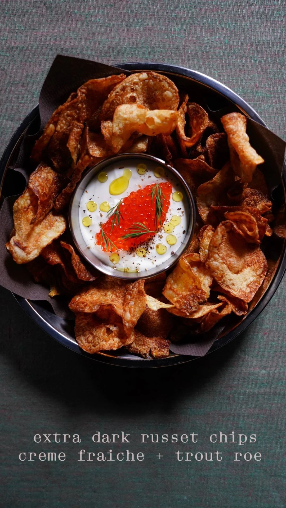 Triple fried russet chips with creme fraiche and smoked trout roe