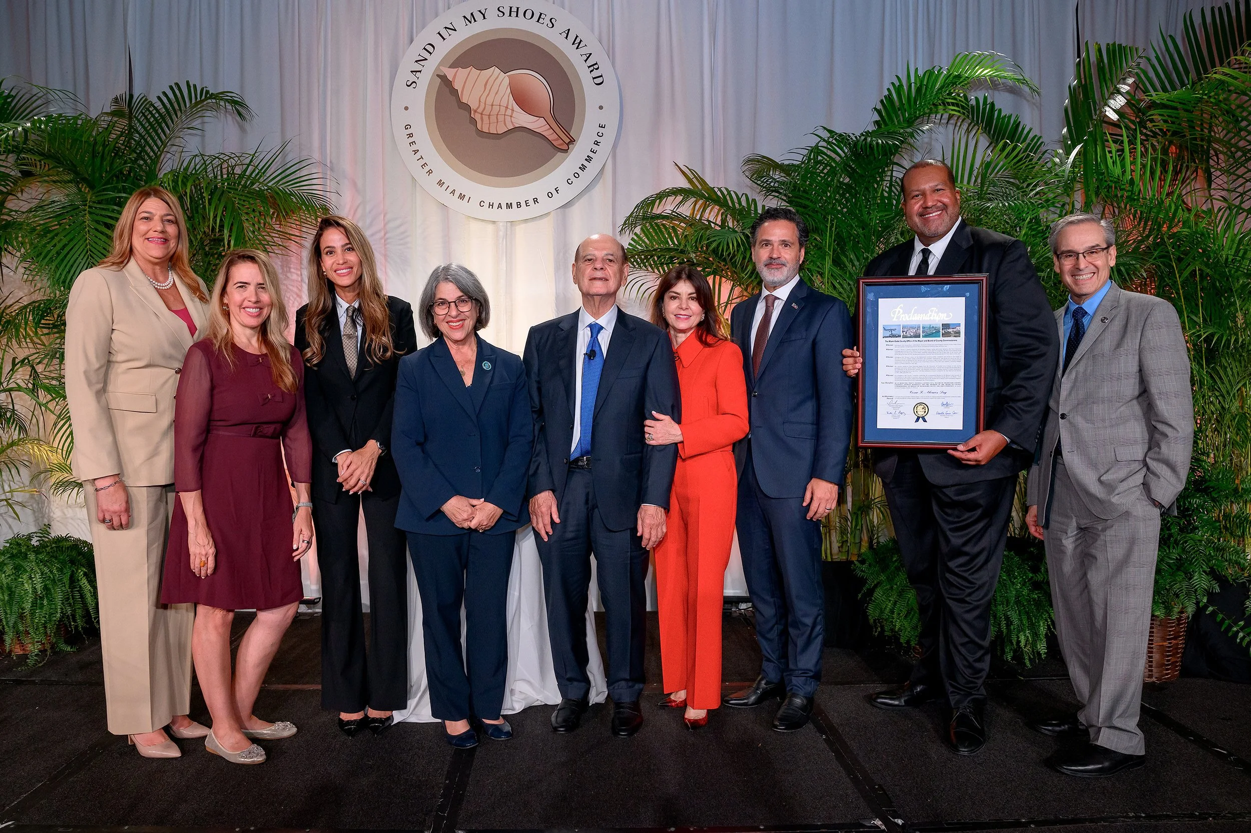 Miami-Dade Mayor Daniella Levine Cava presents a proclamation to Cesar Alvarez