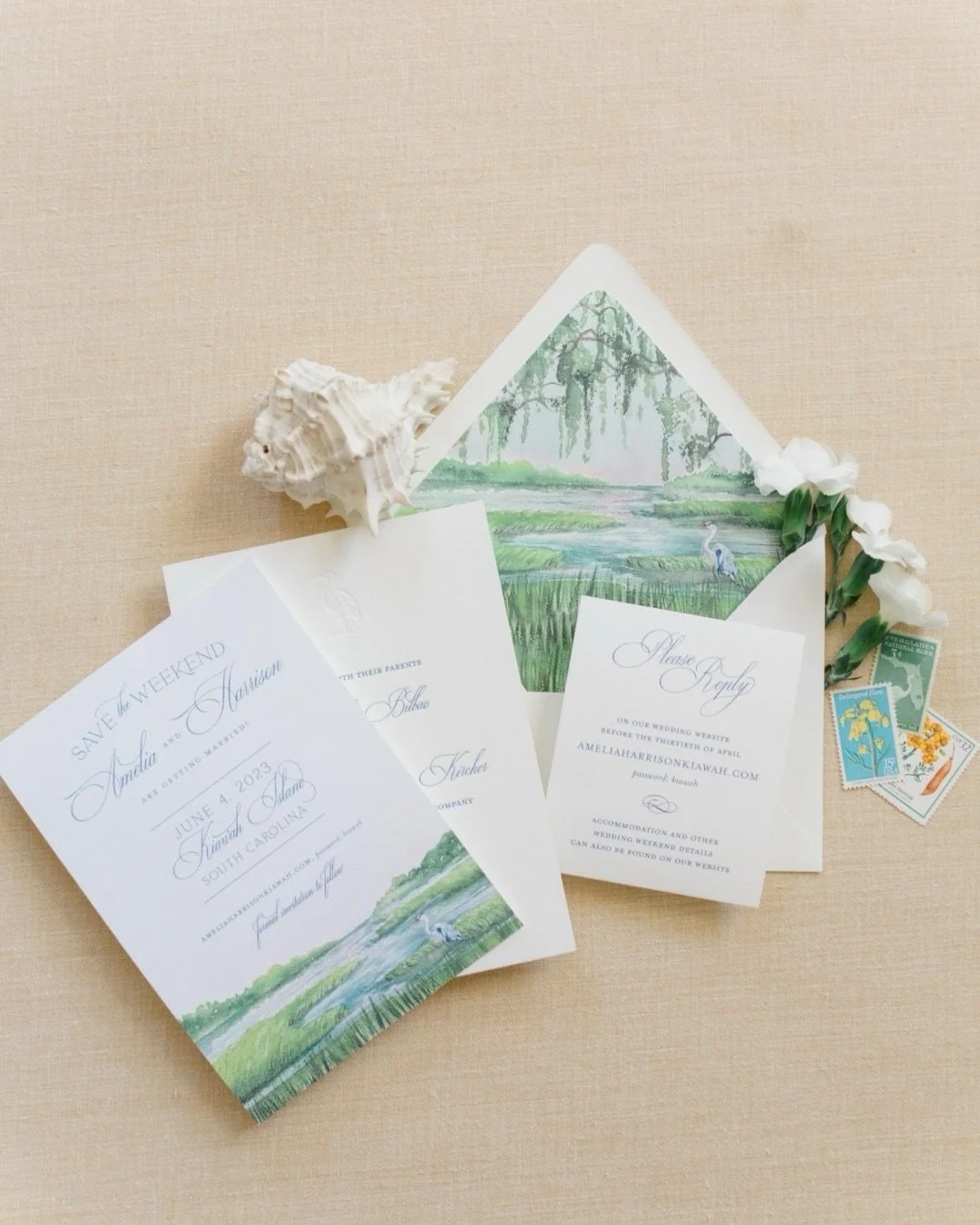 When a wedding weekend is rooted in the charm of the South Carolina coast, the stationery should tell that story from the very first touch. From the custom marshland artwork in the liner to the blind deboss crane on the invitation, this suite brings 