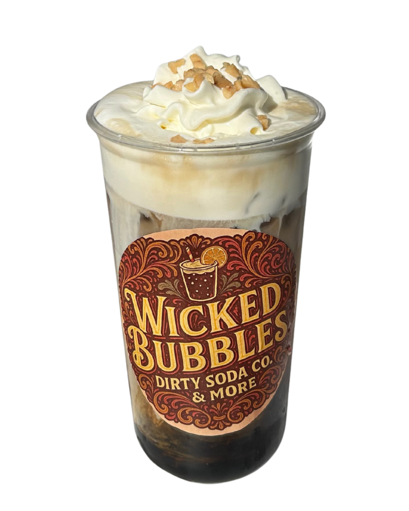 A clear glass filled with dark soda, topped with whipped cream and sprinkled with crushed nuts, with a Wicked Bubbles sticker on the front.