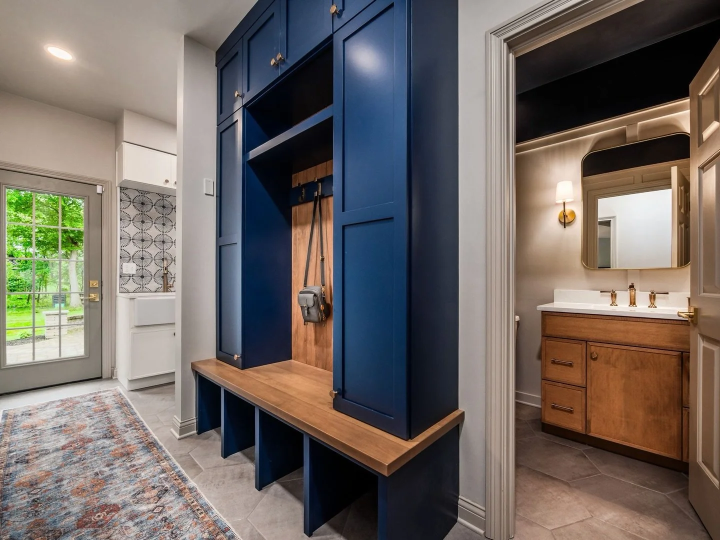 Creating charisma in every home is our passion. We ensure every detail is unique. From hints of noteworthy navy hues to embellished brass fixtures and warm wood accents, each room combines unison with individuality. This multi-room project got the ul