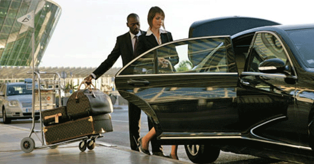 Woman entering a car at MBJ airport to visit Jamaica