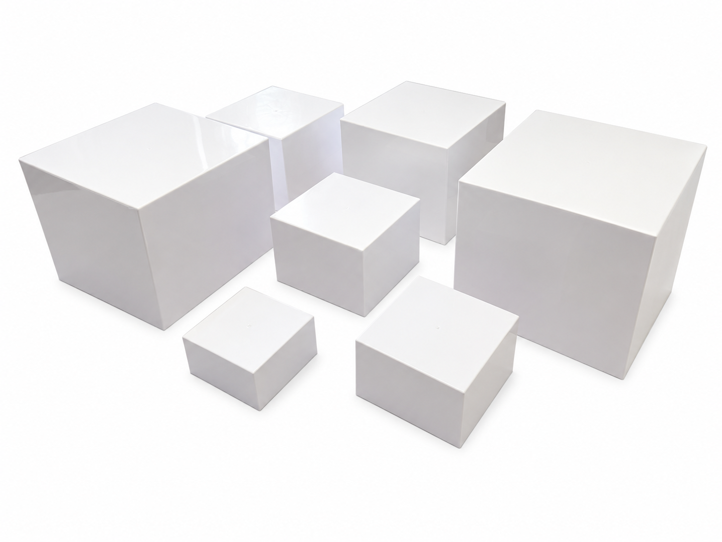 Various sizes of plain white boxes arranged on a white background.