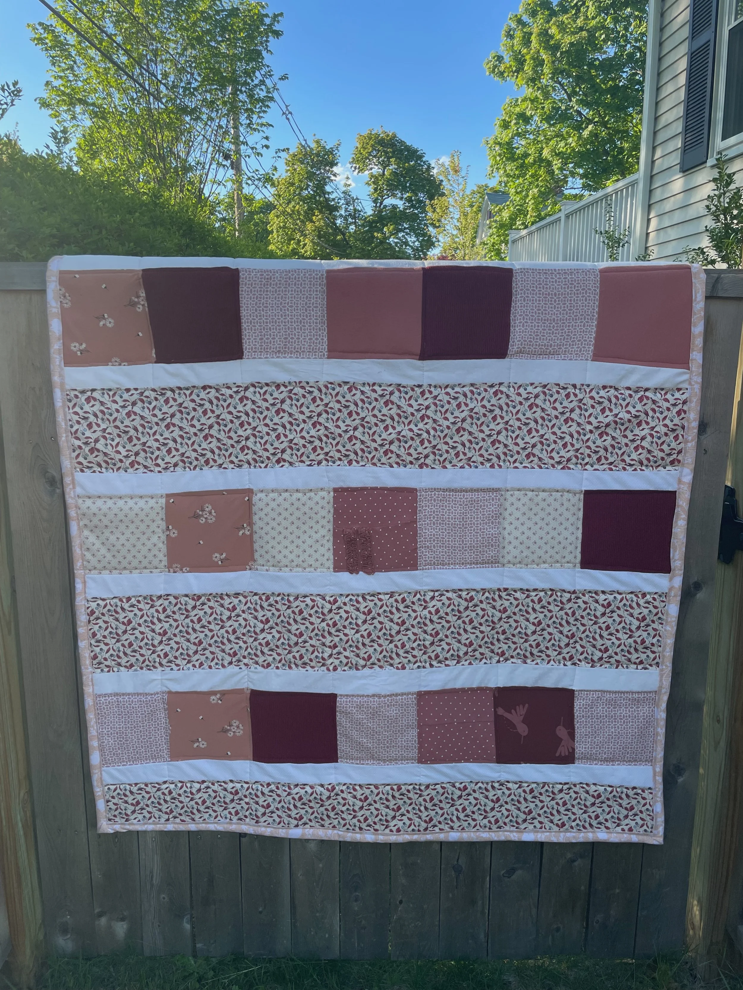 Quilt made from baby clothes