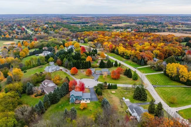 Aerial view of residential homes and rural landscapes, homes and roofs in North Prairie, Wisconsin