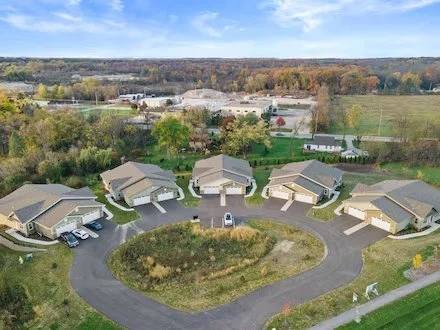 Aerial view of residential neighborhood roofs in Lannon, Wisconsin