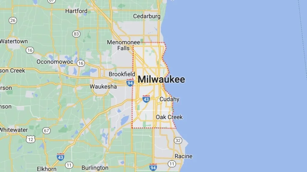 Map showing Milwaukee, Wisconsin, and surrounding areas with roads and nearby towns.