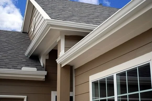 Seamless gutter installation on Wisconsin home by Lion Guard Roofing
