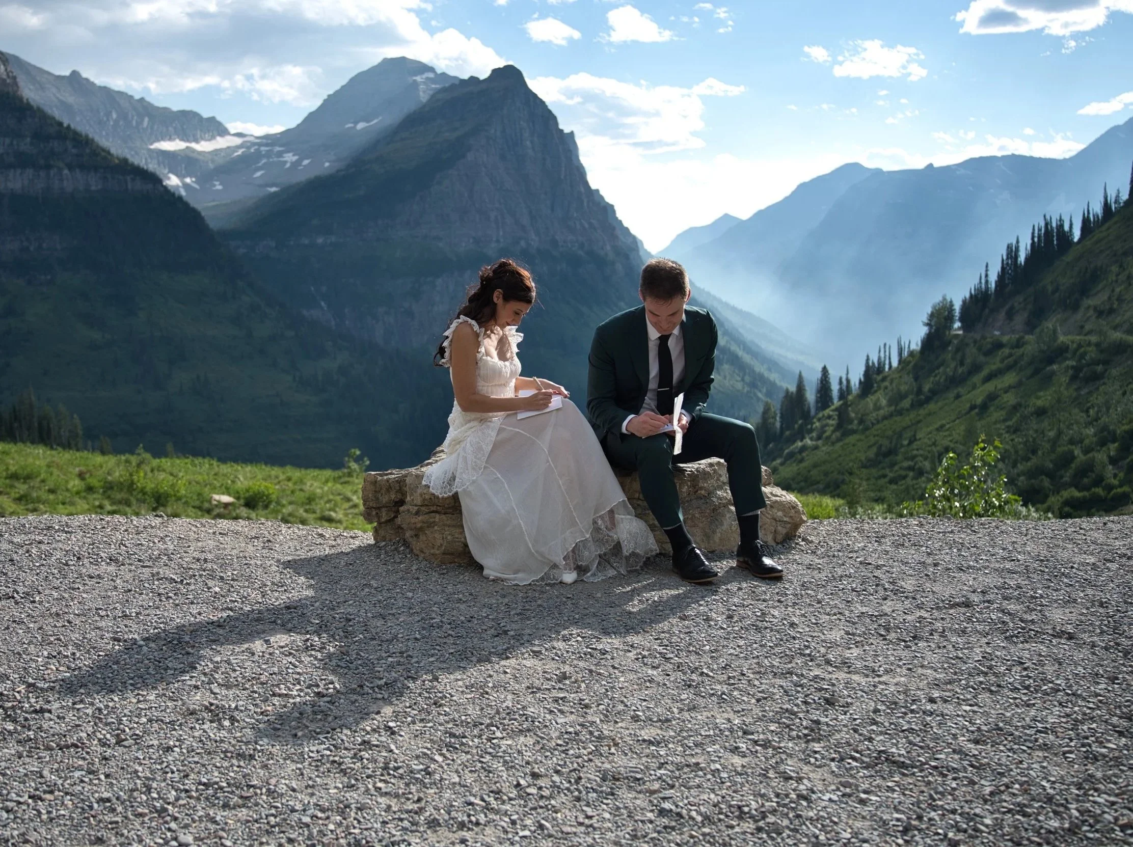Couple exchanging vows in mountains