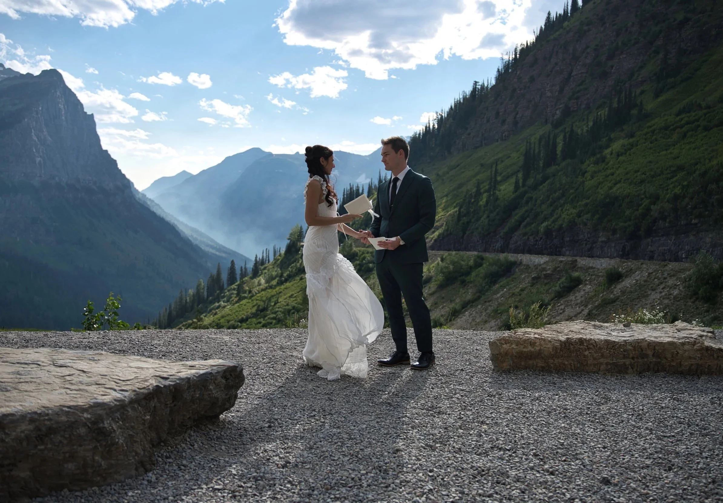 Couple exchanging vows in mountains