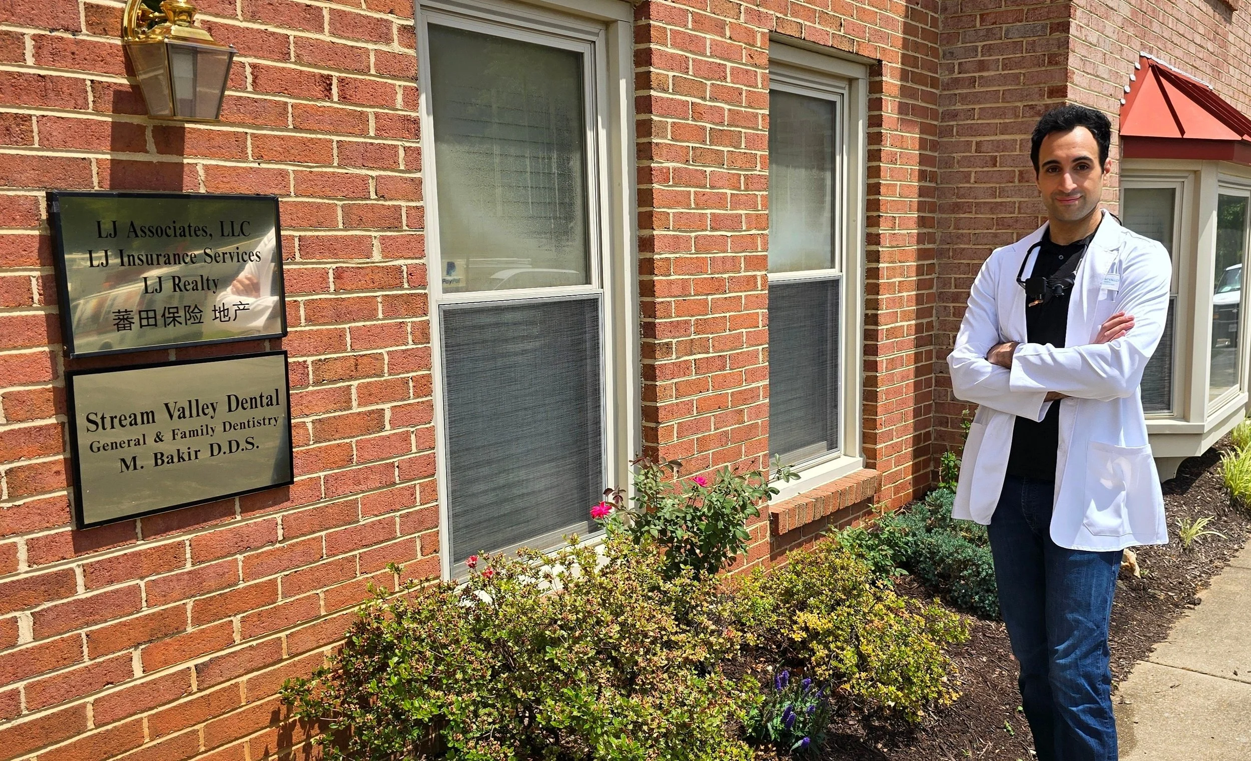 Dr. Bakir outside of Stream Valley Dental