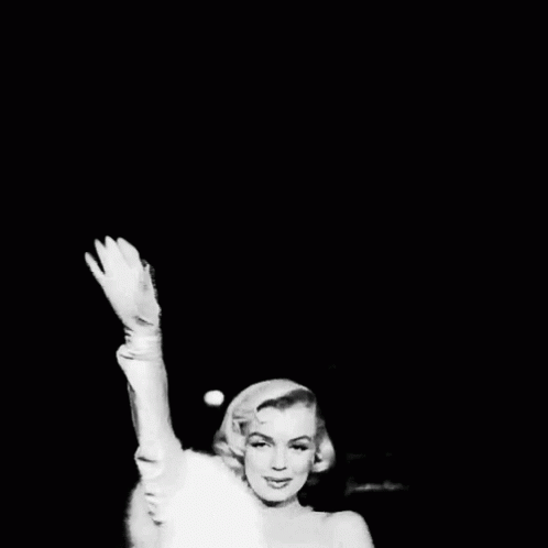 marilyn-monroe-waving-in-front-of-the-camera-0pqlq9yx9ae0zle9.gif