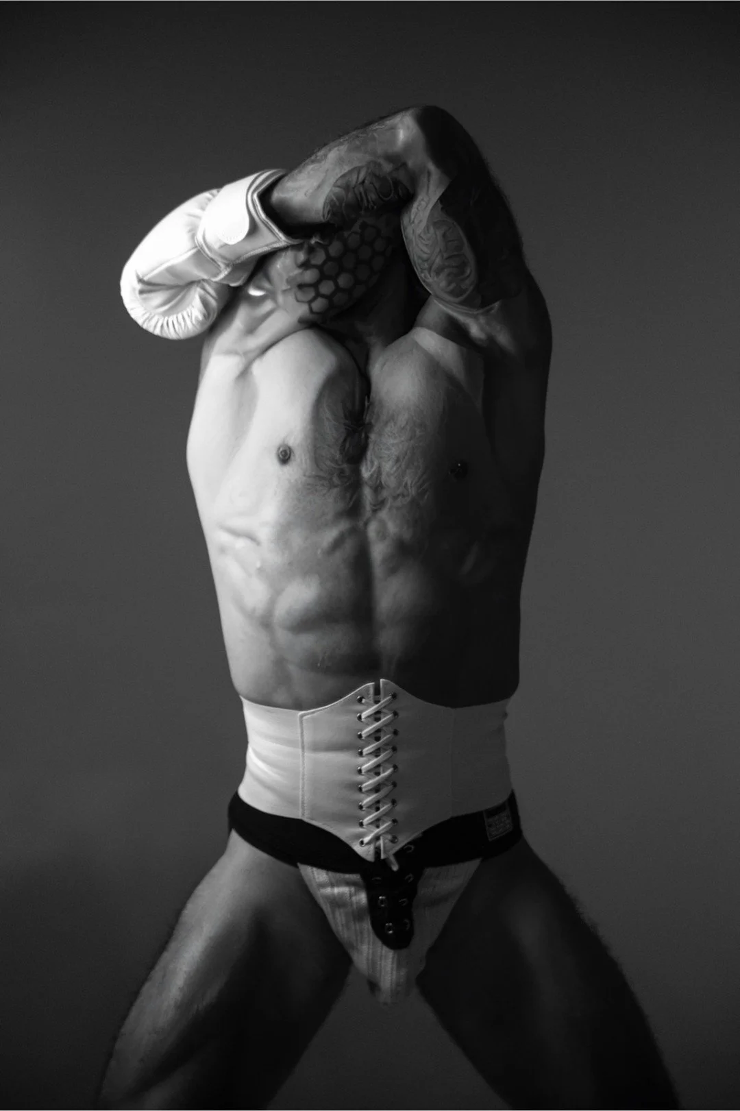 Art isn't just what you see: it's how you express yourself.

This black and white captures the beauty of body art and creative style. Every tattoo tells a story, every pose speaks volumes.

Professional artistry meets personal expression. Safe-for-wo