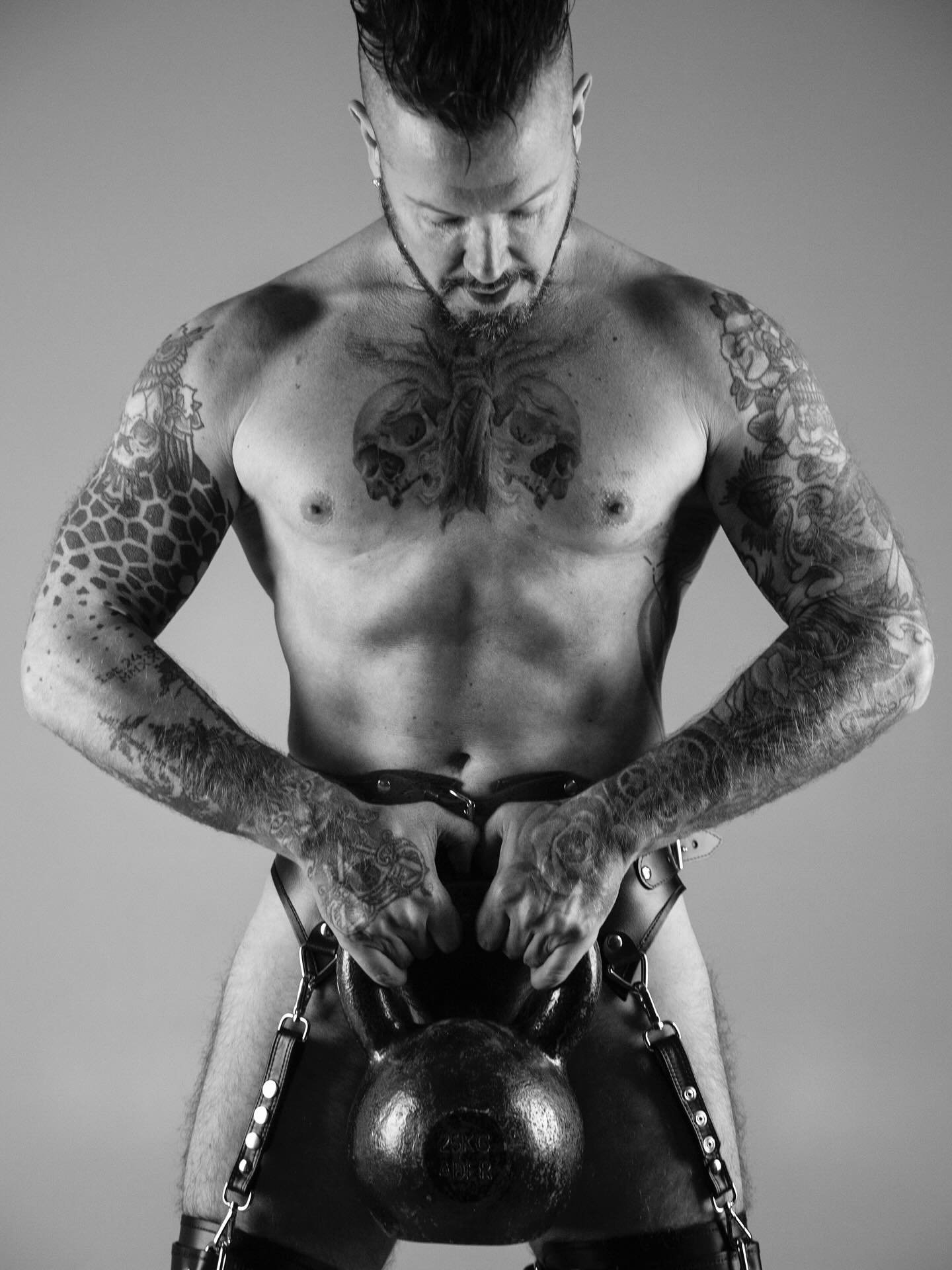 The body as canvas.
The weight as symbol.
The moment as art.

#ArtPhotography
#BodyAsArt
#MasculineForm
#TattooStory
#ModernMuse
#RawArtistry
#BoldAndBare
#BlackAndWhiteArt
#ContemporaryMuse
#strengthinstillness