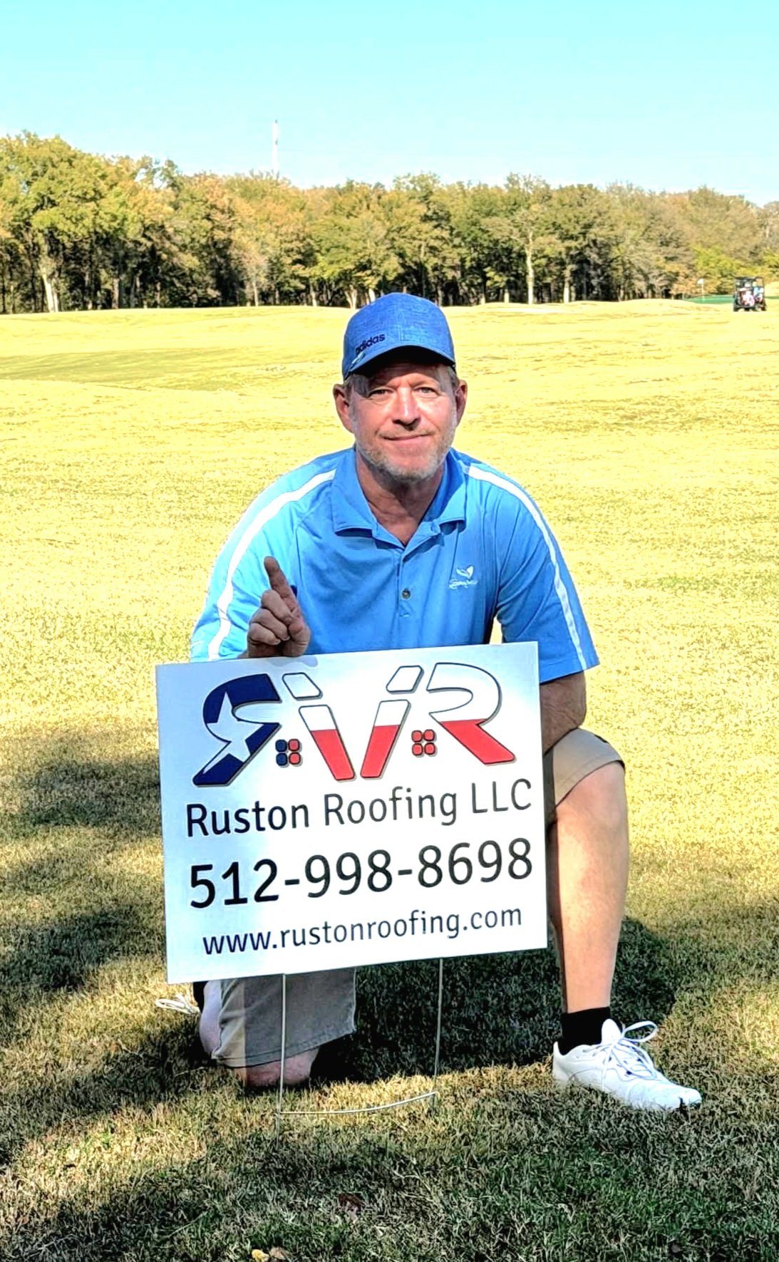 Owner with Company Sign