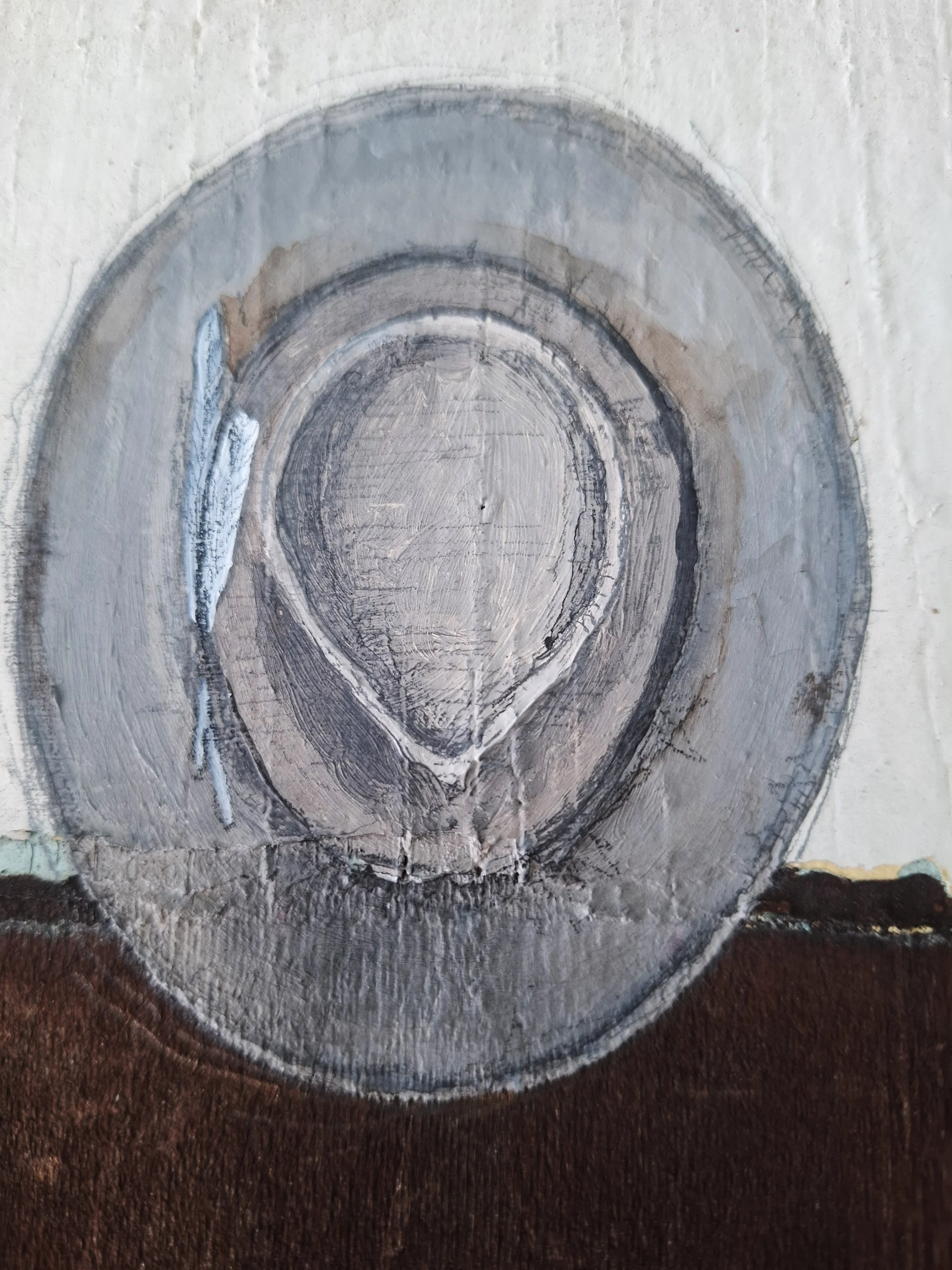 Well worn hat on house shingle - Detail.jpg