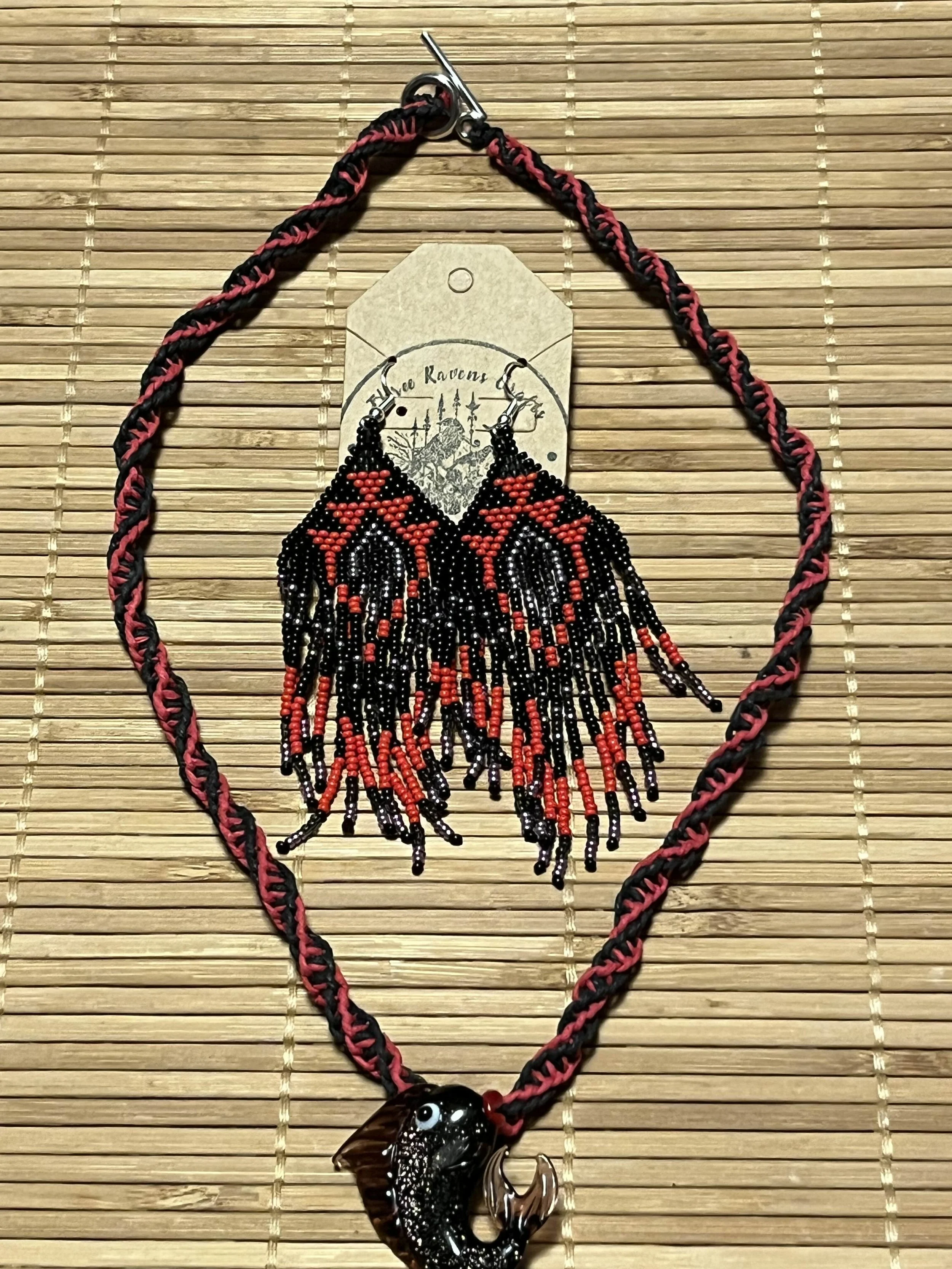 Glass fish w/ earnings  By Three Ravens