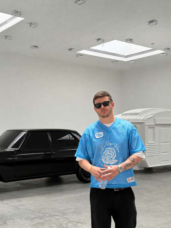 Juan García, founder of GALERI, visiting an art exhibition.